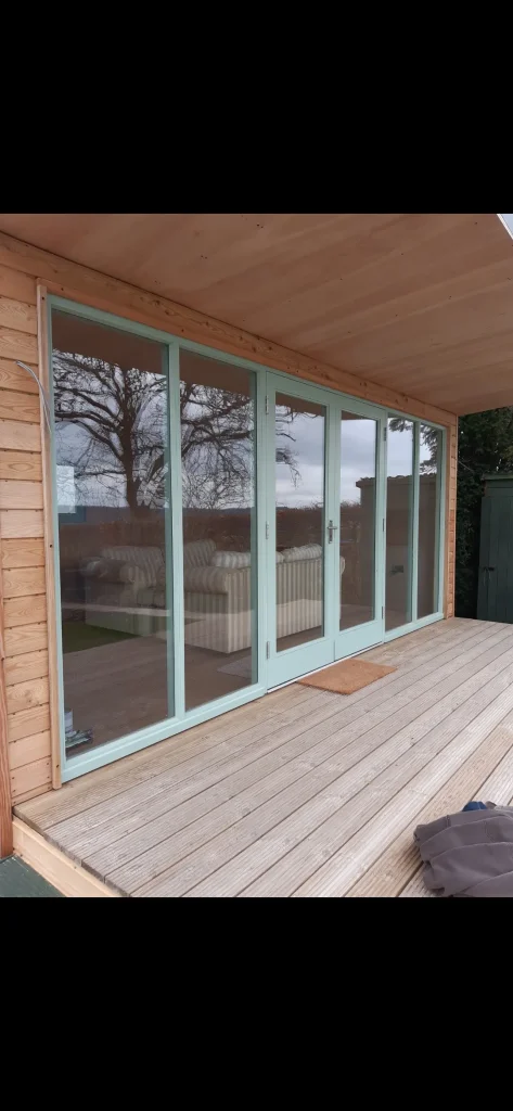 Custom built summer house windows and french doors by J Preece Design bespoke joinery in Shropshire